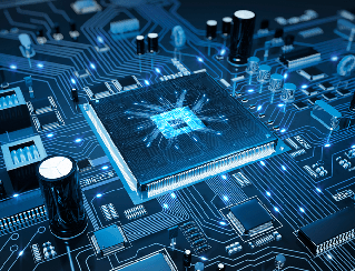 Close-up of a blue circuit board with a central microprocessor and surrounding components, highlighting dense electronics.