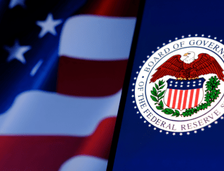 American flag beside the Seal of the Board of Governors of the Federal Reserve System.