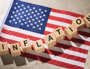 Block letters spelling INFLATION over an American flag background.