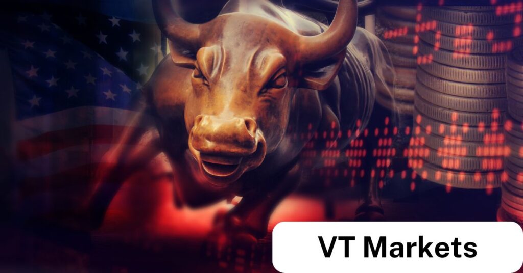 A charging bull statue symbolising a bullish market, with stock charts, coin stacks, and the US flag in the background — representing the dynamics of trading vs investing for VT Markets.