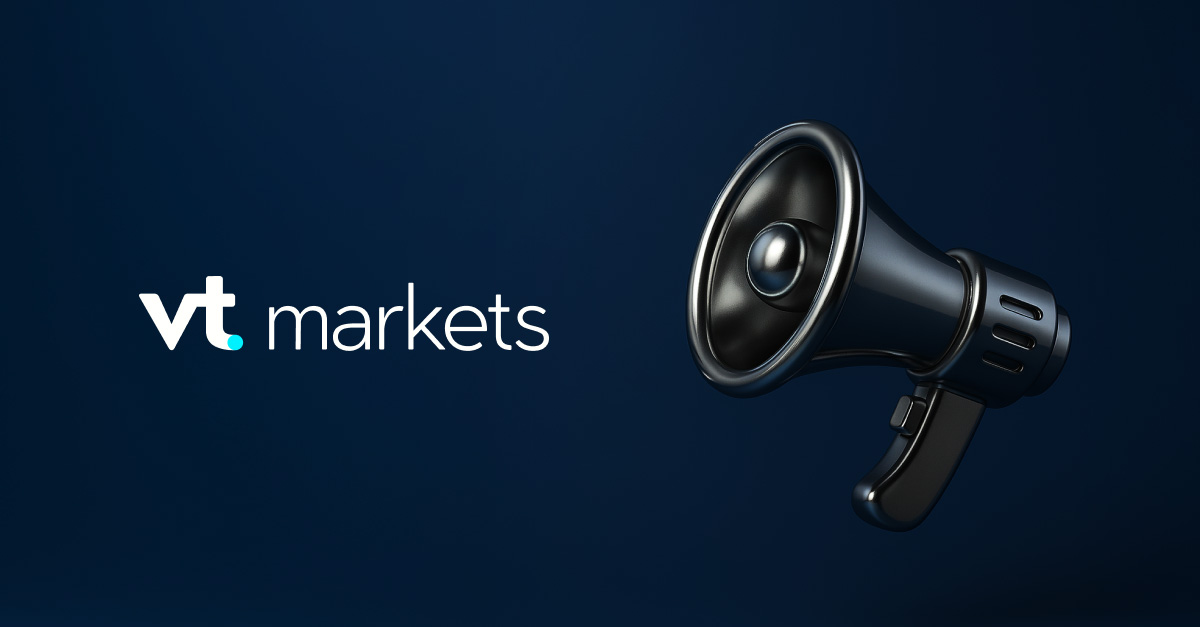 VT Markets logo on the left with a large metallic megaphone on a dark blue background, signaling marketing/announcement effects.